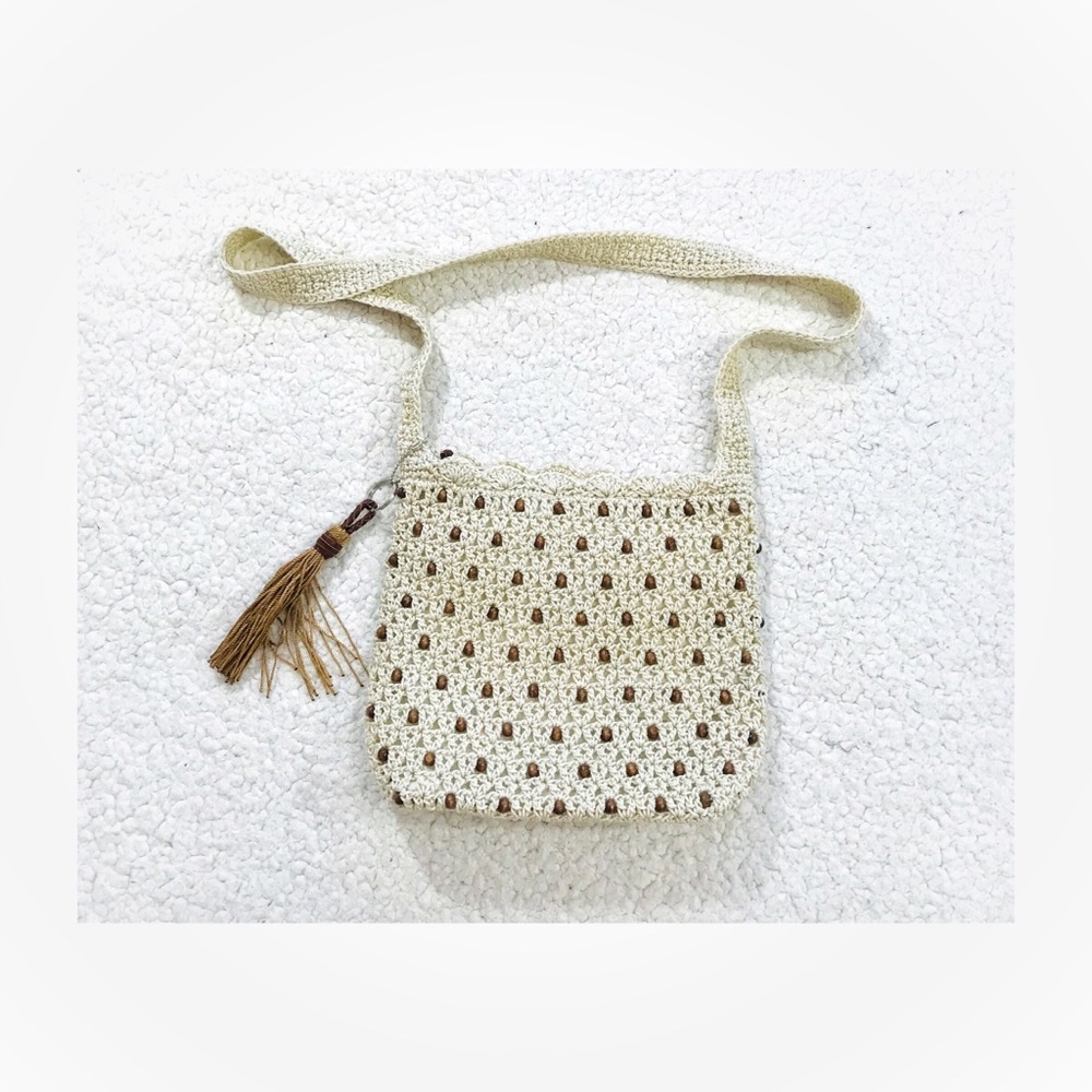 The Sak woven beaded crossbody bag
